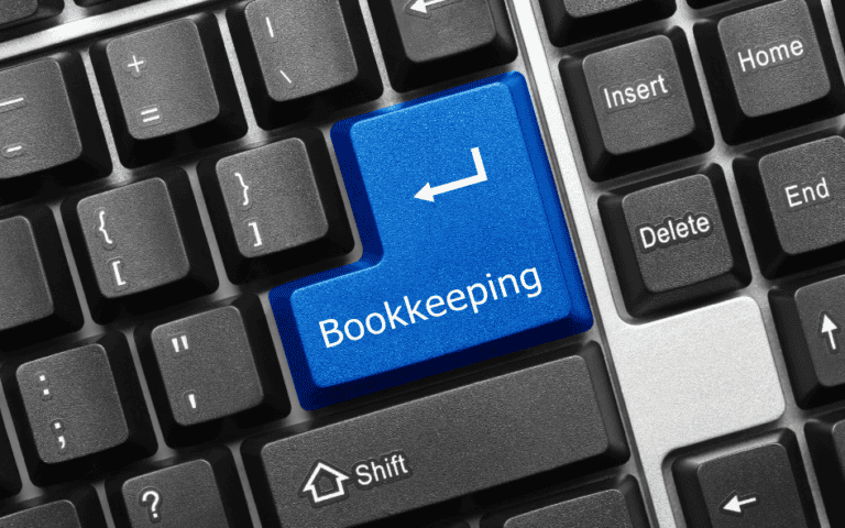 Computer keyboard with bookkeeping tasks - Catch Up Bookkeeping Services